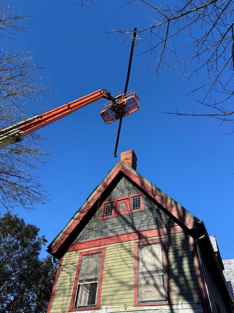 Working on the gable from a lift.